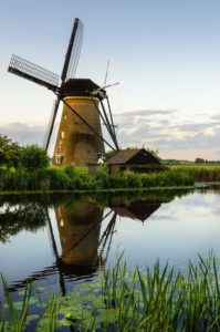 Typical Dutch Windmill and Reflectiona in Water