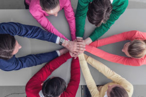 People joining hands